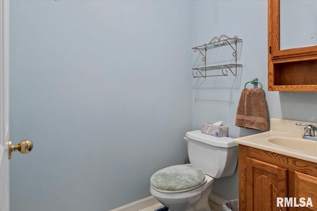 3300 Winch Rd, Springfield, IL 62707 - half bath with vanity, toilet, and baseboards