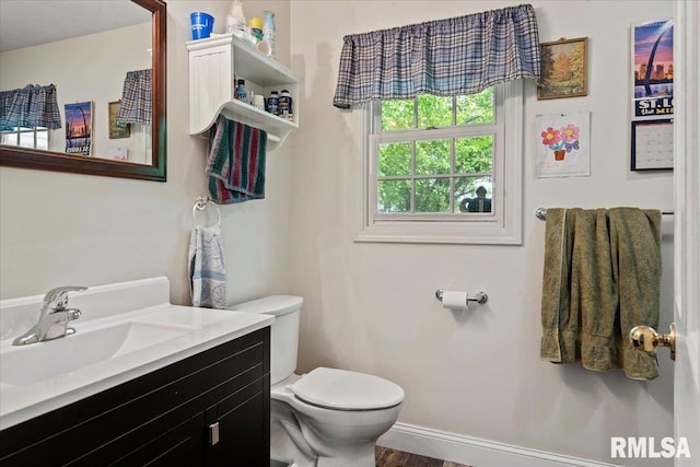 3300 Winch Rd, Springfield, IL 62707 - half bath with toilet, vanity, and baseboards