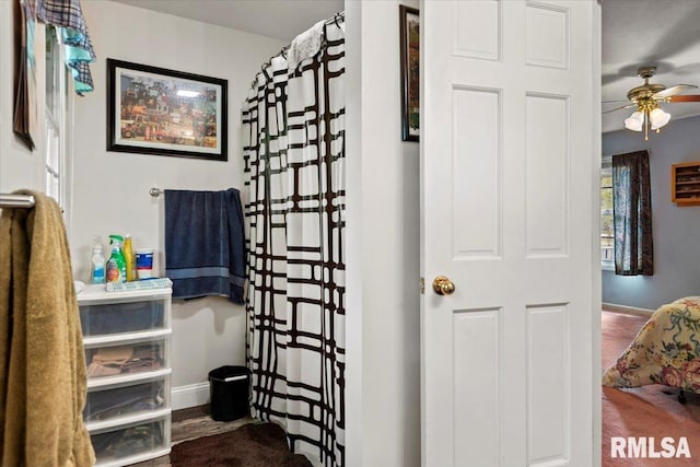 3300 Winch Rd, Springfield, IL 62707 - full bathroom with a ceiling fan, baseboards, and a shower with curtain