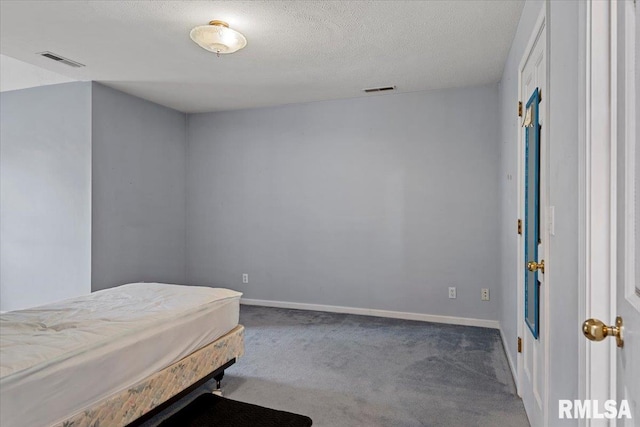 3300 Winch Rd, Springfield, IL 62707 - carpeted bedroom featuring a textured ceiling and baseboards