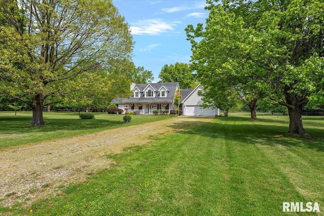 3300 Winch Rd, Springfield, IL 62707 - cape cod house featuring an attached garage, a front lawn, dirt driveway, and a porch