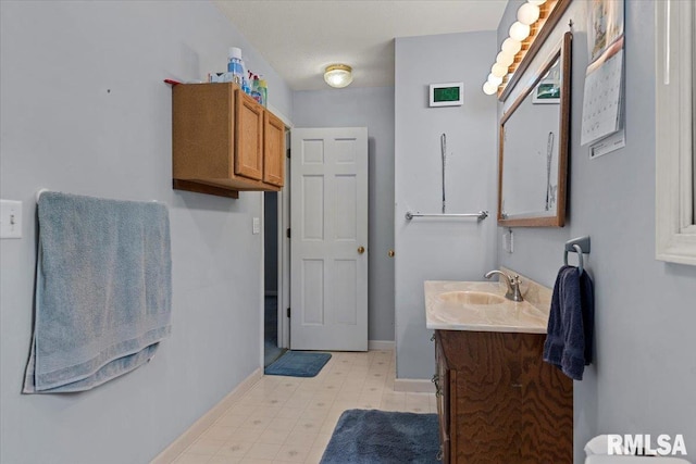 3300 Winch Rd, Springfield, IL 62707 - bathroom featuring vanity, tile patterned floors, and baseboards