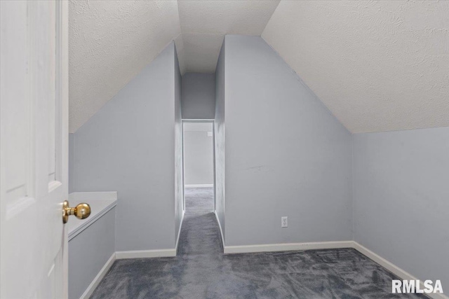 3300 Winch Rd, Springfield, IL 62707 - bonus room with a textured ceiling, vaulted ceiling, carpet, and baseboards