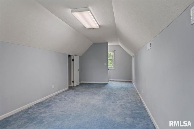 3300 Winch Rd, Springfield, IL 62707 - bonus room with vaulted ceiling, carpet floors, a textured ceiling, and baseboards