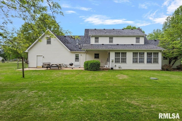 3300 Winch Rd, Springfield, IL 62707 - back of house featuring a patio, a lawn, roof with shingles, and a chimney