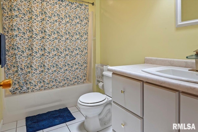 bathroom with vanity, shower / tub combo, tile patterned floors, and toilet