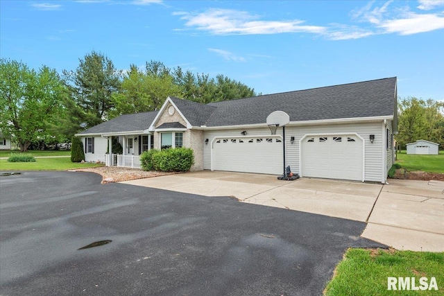 view of front facade featuring concrete driveway, an attached garage, covered porch, and a front lawn