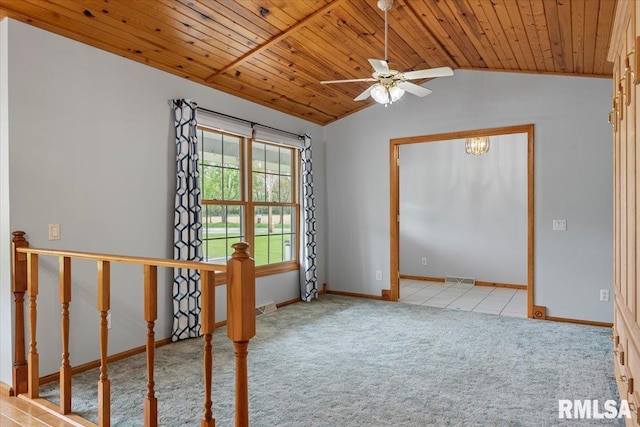 empty room with a ceiling fan, visible vents, wooden ceiling, lofted ceiling, and carpet flooring