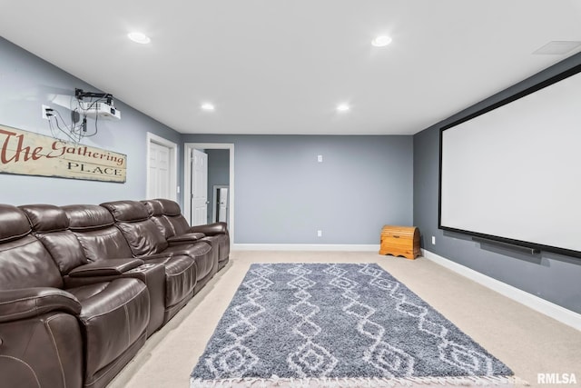 cinema room with light carpet, recessed lighting, and baseboards