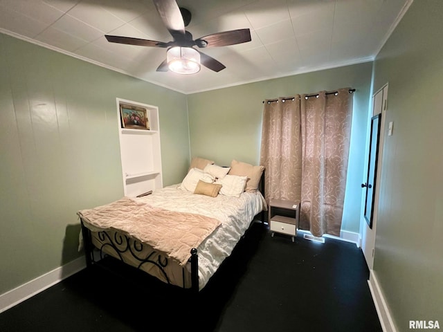 bedroom with crown molding, a ceiling fan, and baseboards