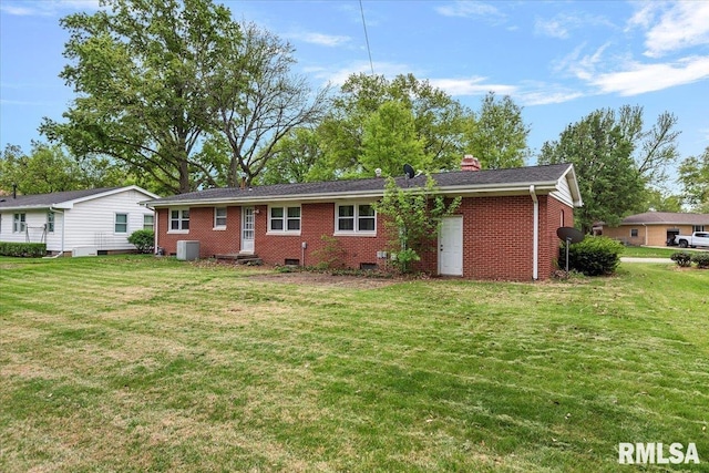 back of house with a lawn, brick siding, crawl space, and cooling unit