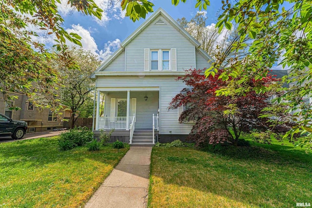 view of front of home featuring a porch and a front lawn