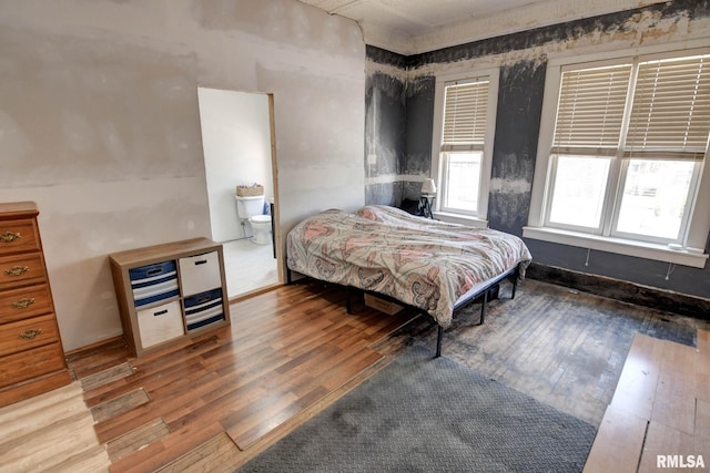 629 W Adams St, Taylorville, IL 62568 - bedroom with hardwood / wood-style flooring