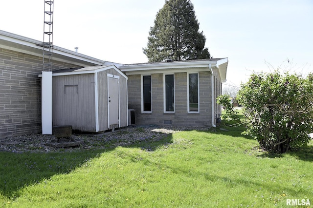 24 Parkway Dr, Sherman, IL 62684 - rear view of house featuring a lawn and brick siding