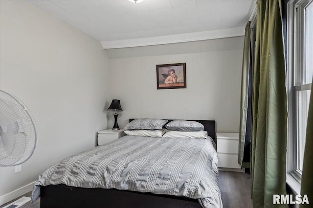 1127 N 6th St, Springfield, IL 62702 - bedroom with visible vents, wood finished floors, and lofted ceiling