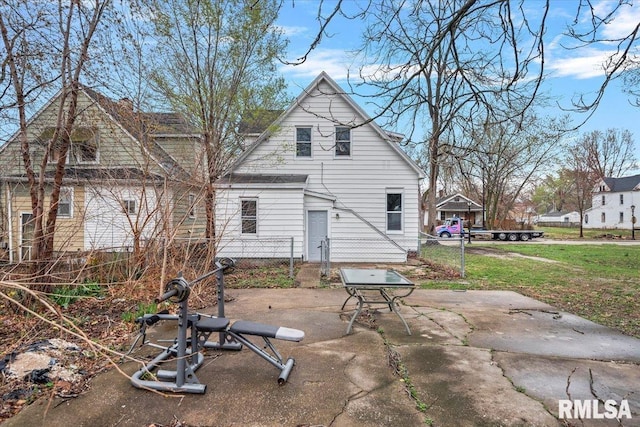1127 N 6th St, Springfield, IL 62702 - rear view of house with a lawn and fence