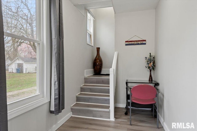 1127 N 6th St, Springfield, IL 62702 - staircase with baseboards and wood finished floors