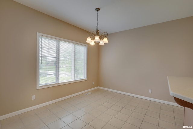 3408 Wynvalley Rd, Quincy, IL 62301 - empty room with a chandelier and baseboards