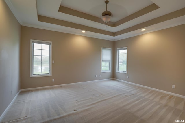 3408 Wynvalley Rd, Quincy, IL 62301 - empty room featuring a tray ceiling, baseboards, light colored carpet, a ceiling fan, and recessed lighting