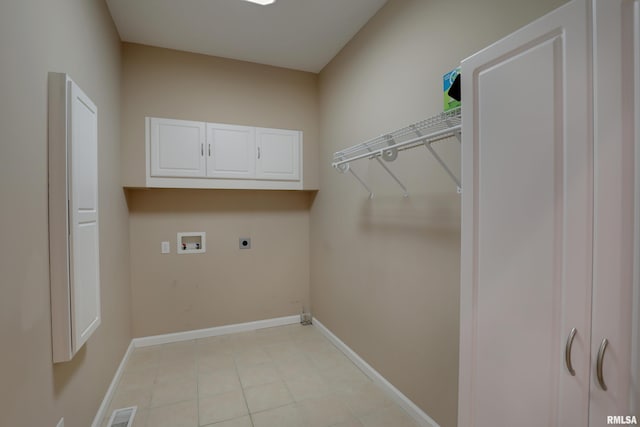 3408 Wynvalley Rd, Quincy, IL 62301 - washroom with hookup for a washing machine, electric dryer hookup, cabinet space, and baseboards