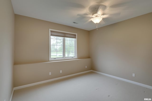 3408 Wynvalley Rd, Quincy, IL 62301 - spare room featuring light carpet, ceiling fan, and baseboards