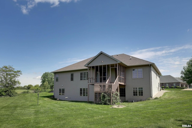 3408 Wynvalley Rd, Quincy, IL 62301 - back of house with a sunroom and a lawn