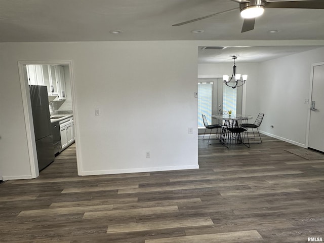 1815 Stonehenge Rd, Springfield, IL 62702 - dining space featuring a ceiling fan, dark wood-type flooring, a chandelier, and recessed lighting