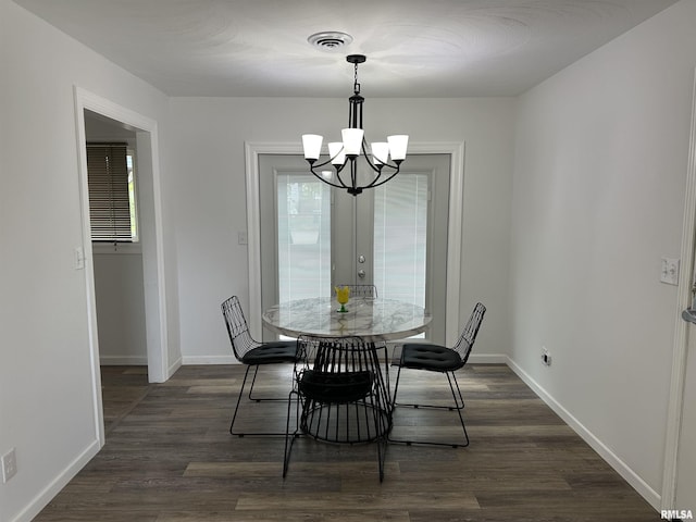 1815 Stonehenge Rd, Springfield, IL 62702 - dining room with a chandelier and dark wood finished floors