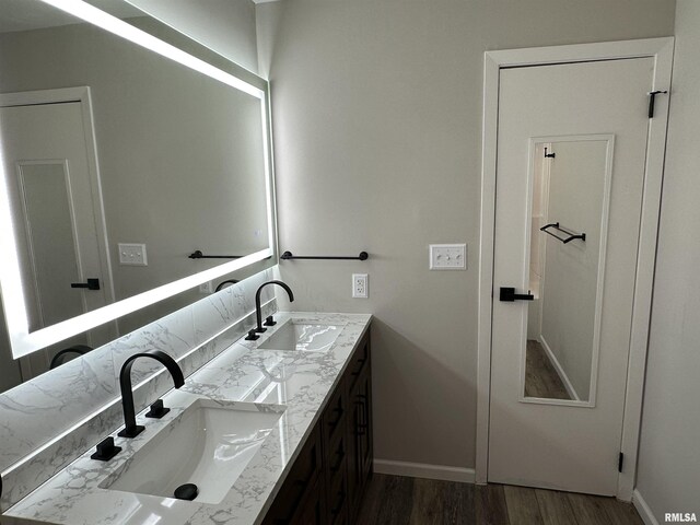 1815 Stonehenge Rd, Springfield, IL 62702 - bathroom with double vanity and wood finished floors