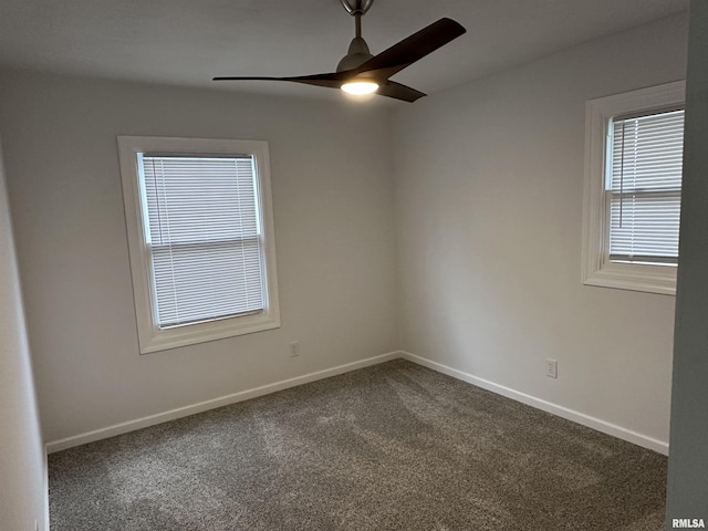 1815 Stonehenge Rd, Springfield, IL 62702 - empty room with a ceiling fan and dark colored carpet