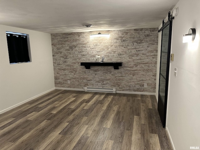 1815 Stonehenge Rd, Springfield, IL 62702 - unfurnished living room featuring a baseboard heating unit, dark wood-style floors, and a barn door