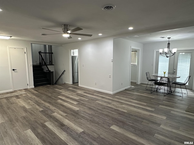 1815 Stonehenge Rd, Springfield, IL 62702 - unfurnished living room featuring recessed lighting, ceiling fan, dark wood-type flooring, a chandelier, and stairs