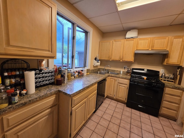 kitchen featuring a paneled ceiling, a sink, black appliances, light brown cabinets, and under cabinet range hood
