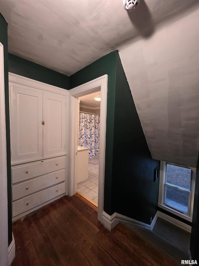 hallway featuring dark wood finished floors