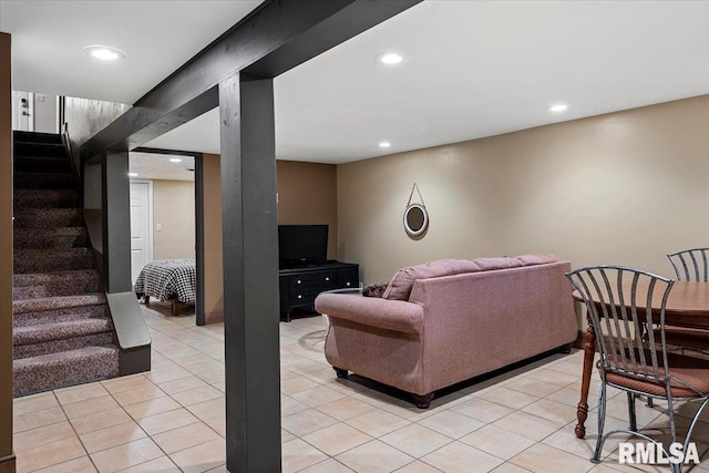 living room with recessed lighting, light tile patterned floors, and stairway