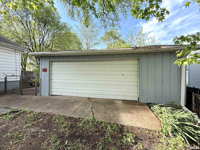 detached garage with fence