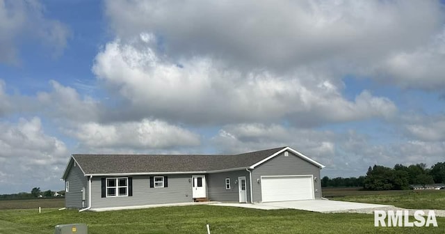 ranch-style home featuring a garage, driveway, and a front lawn