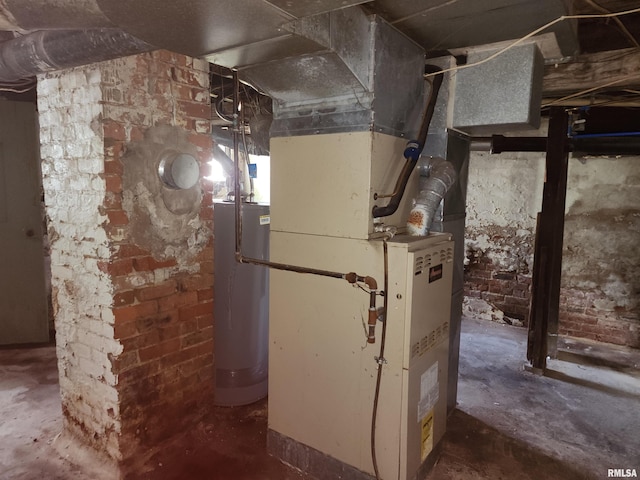 utility room featuring water heater and heating unit