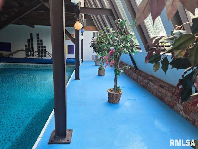 outdoor pool with a patio