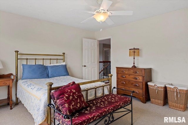 bedroom with carpet floors and a ceiling fan