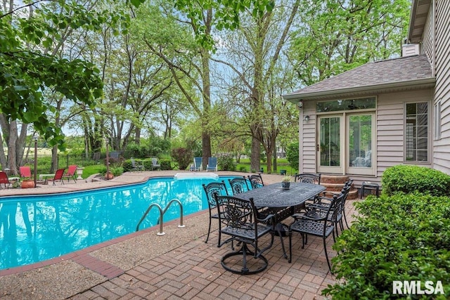 view of pool with a patio, a fenced in pool, and fence