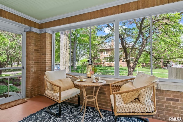 sunroom / solarium featuring plenty of natural light