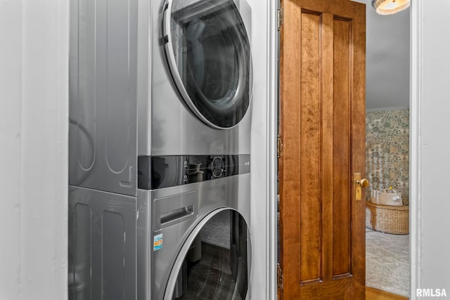washroom with laundry area and stacked washer and dryer