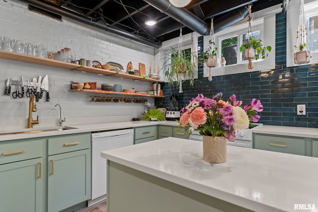 bar with backsplash, white dishwasher, and a sink