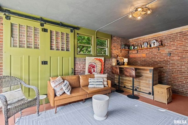 interior space featuring a dry bar and brick wall
