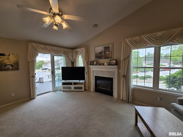 2704 Kings Pointe NE Unit 2704, Quincy, IL 62305 - living room with light carpet, a fireplace, ceiling fan, and vaulted ceiling
