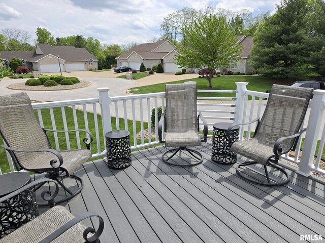 2704 Kings Pointe NE Unit 2704, Quincy, IL 62305 - wooden terrace featuring a yard and a residential view