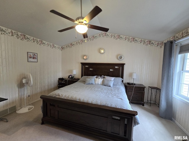 2704 Kings Pointe NE Unit 2704, Quincy, IL 62305 - bedroom with lofted ceiling, light carpet, a ceiling fan, and baseboards