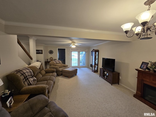 2704 Kings Pointe NE Unit 2704, Quincy, IL 62305 - carpeted living area with baseboards, ornamental molding, ceiling fan with notable chandelier, stairs, and a fireplace