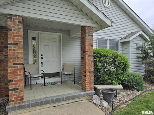 2704 Kings Pointe NE Unit 2704, Quincy, IL 62305 - doorway to property featuring a porch